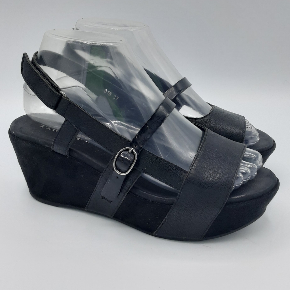 Antelope Black Leather Wedge Sandal.